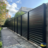 zovmarketing A 1.8 meter high fence constructed from 18 solid 2c30e05f d602 4a3e 90c7 2d251b5f0e97 0