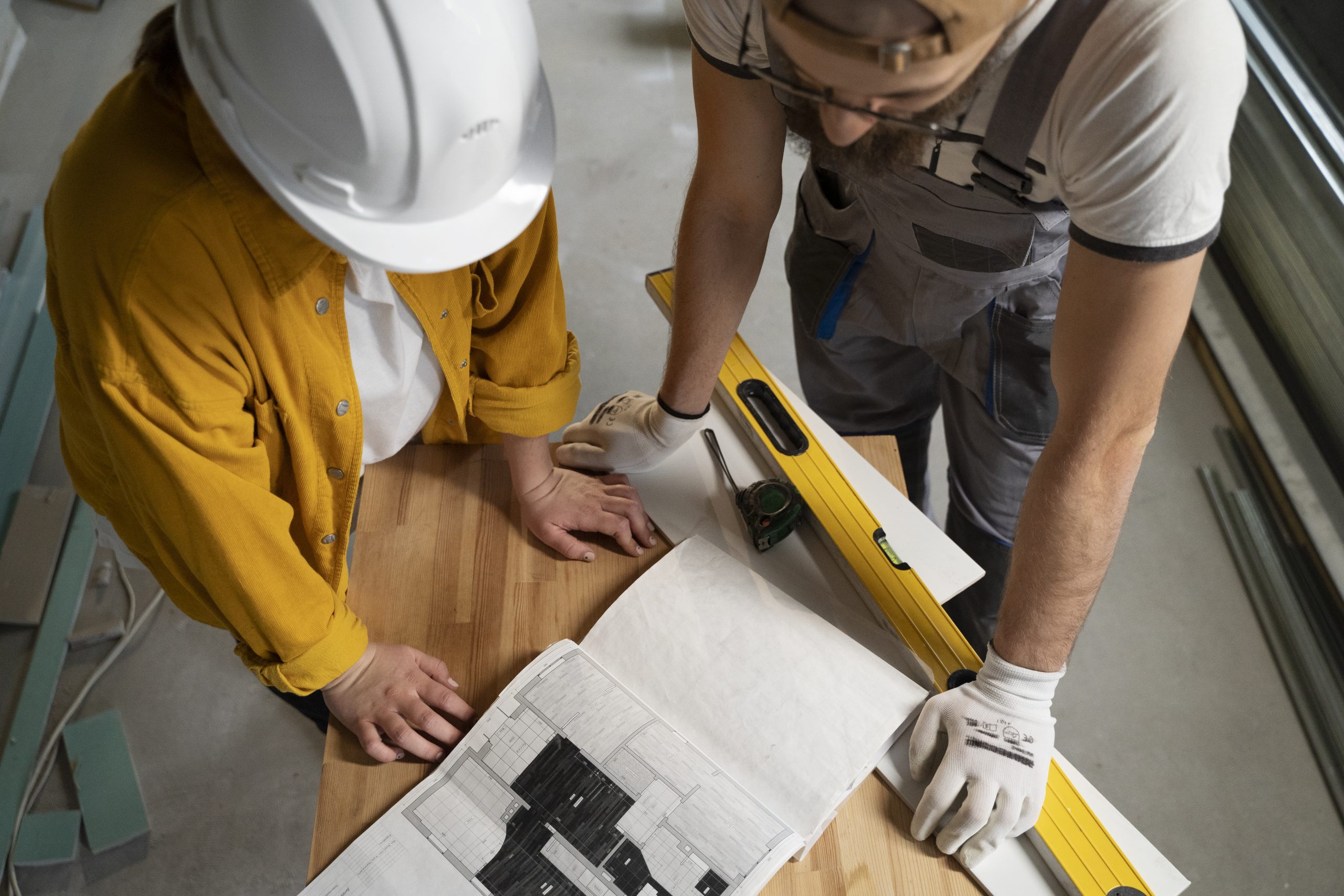 tiler working renovation apartment scaled